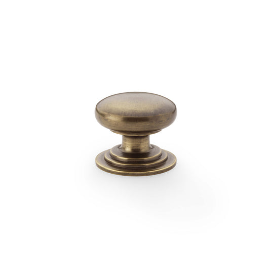 Waltz Round Cupboard Knob on Stepped Rose - Antique Brass - 32mm