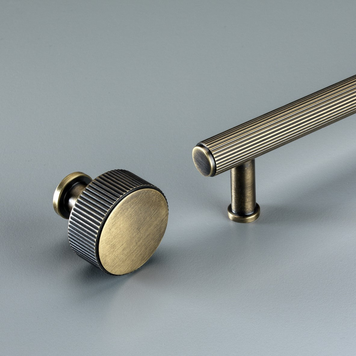 Stirling Brass Cabinet Handle and Knob in Brushed Bronze Finish