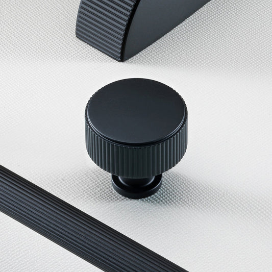Stirling Solid Brass Reeded Cabinet Knob in Matt Black Finish