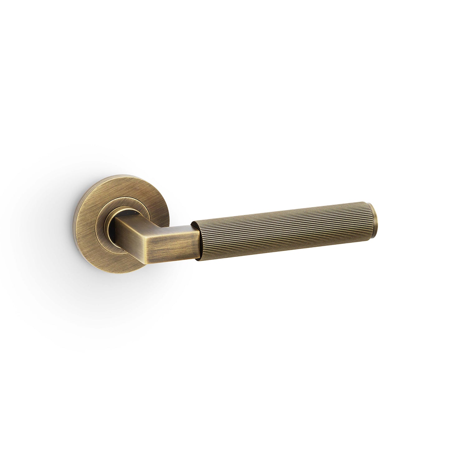 Hurricane Reeded Door Handles On Round Rose