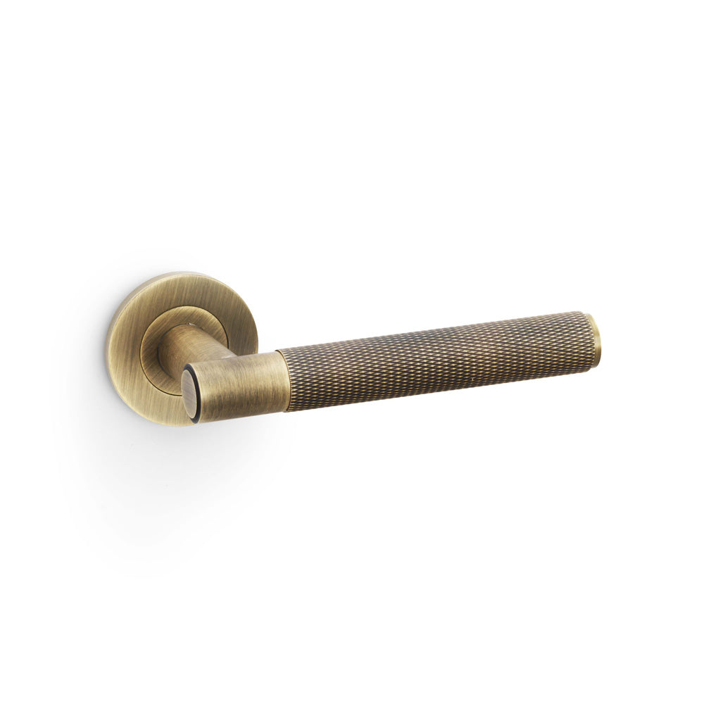 Spitfire Knurled Lever on Round Rose - Antique Brass