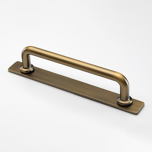 Banbury American bronze cabinet bar handle on backplate by Crofts & Assinder