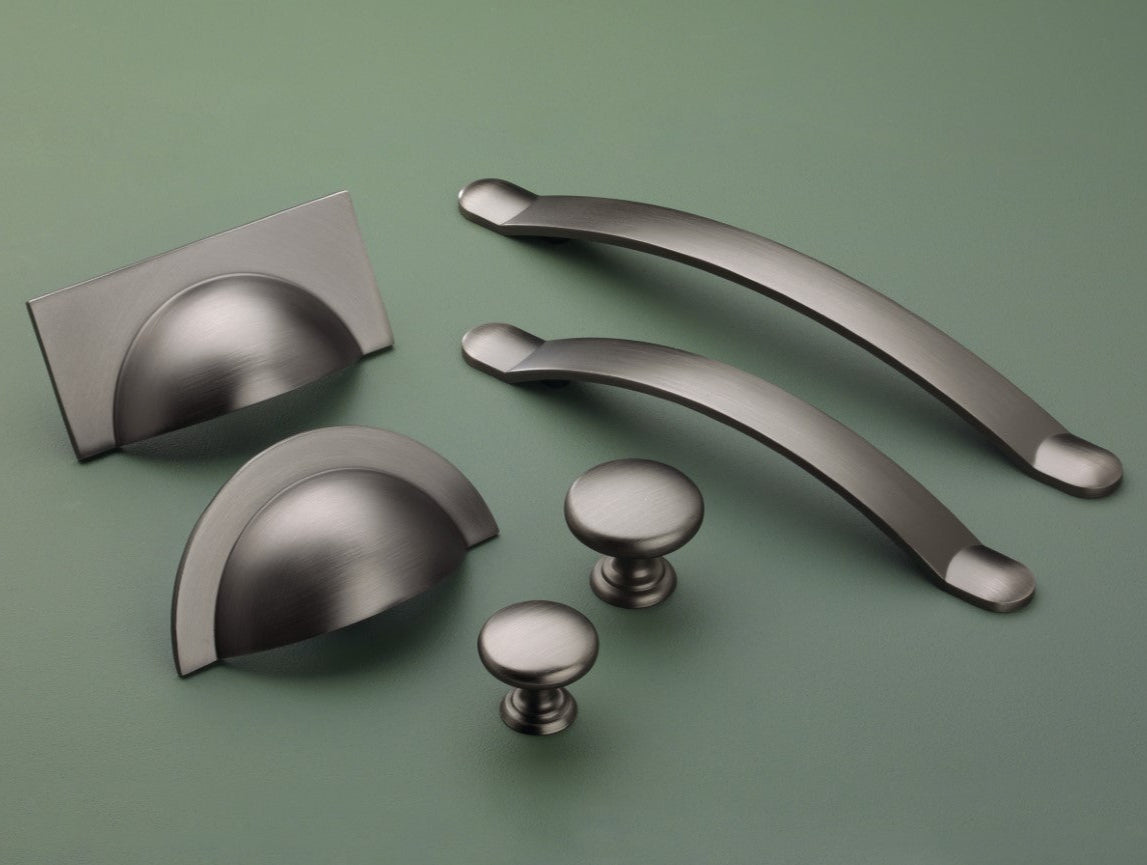 Monmouth gunmetal grey cabinet handle collection with cup handles, bow handles and knobs