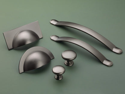 Monmouth gunmetal grey cabinet handle collection with cup handles, bow handles and knobs