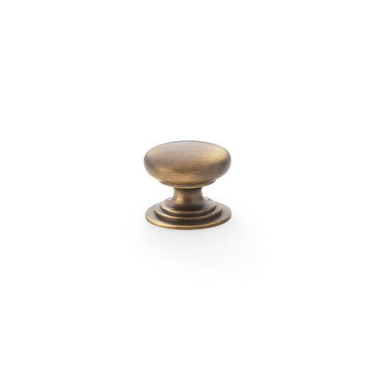 Waltz Round Cupboard Knob on Stepped Rose - Antique Brass - 25mm