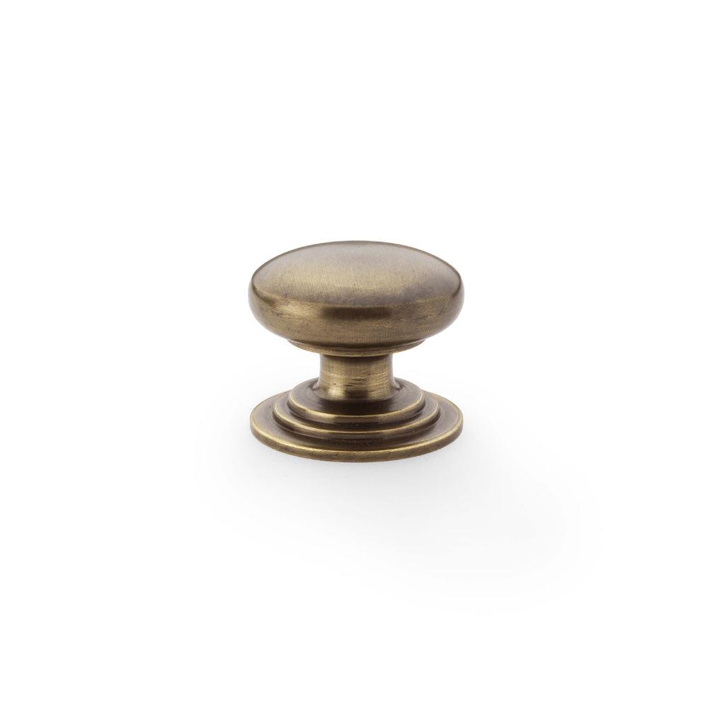 Waltz Round Cupboard Knob on Stepped Rose - Antique Brass - 32mm